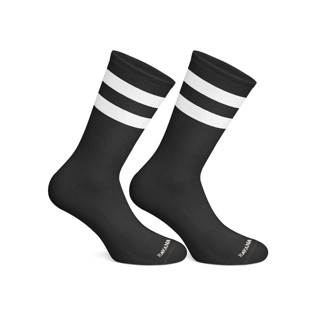 Black socks with white stripes on a white background