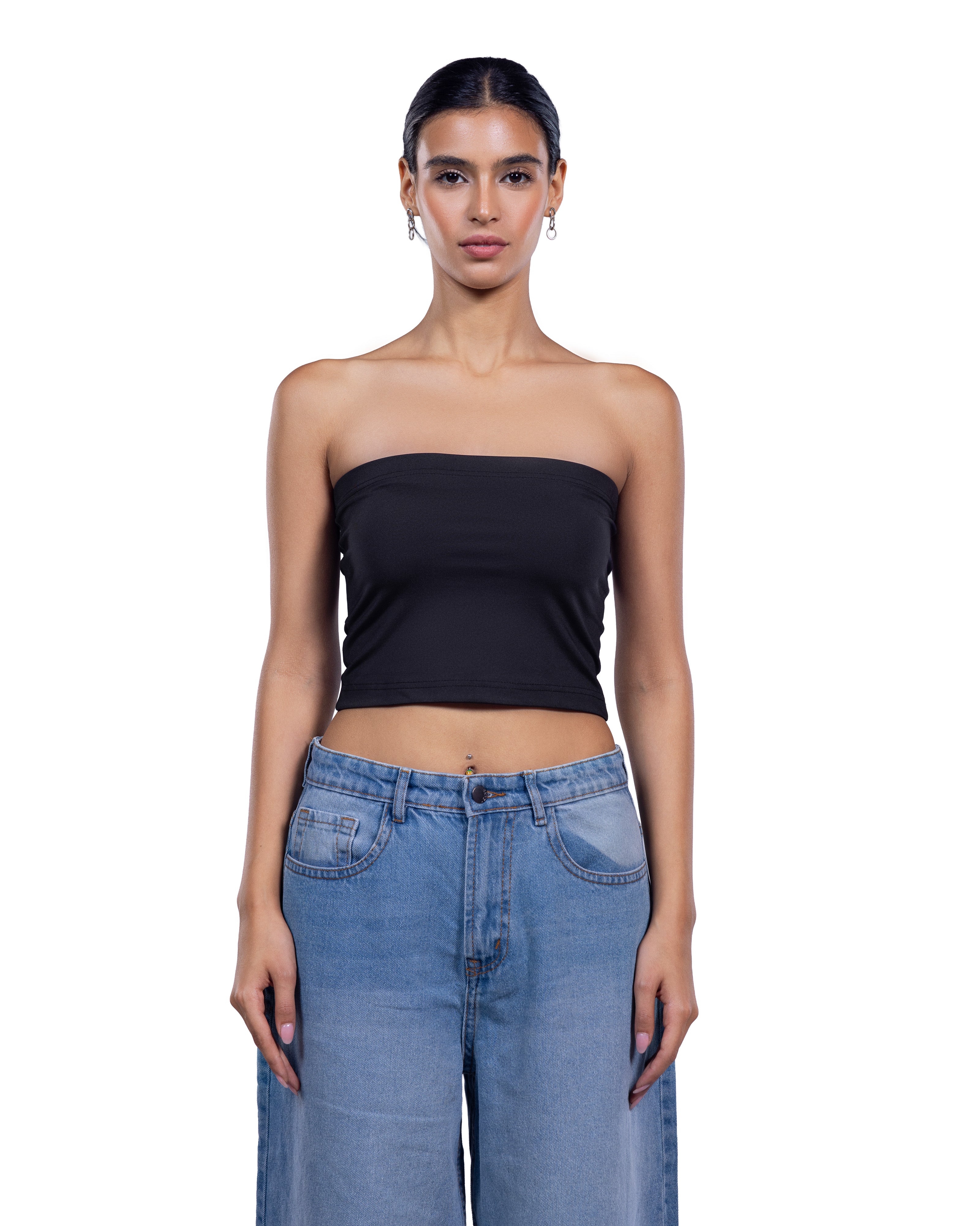 A woman modeling a black strapless bandeau tube top paired with light-wash blue jeans against a plain white background.