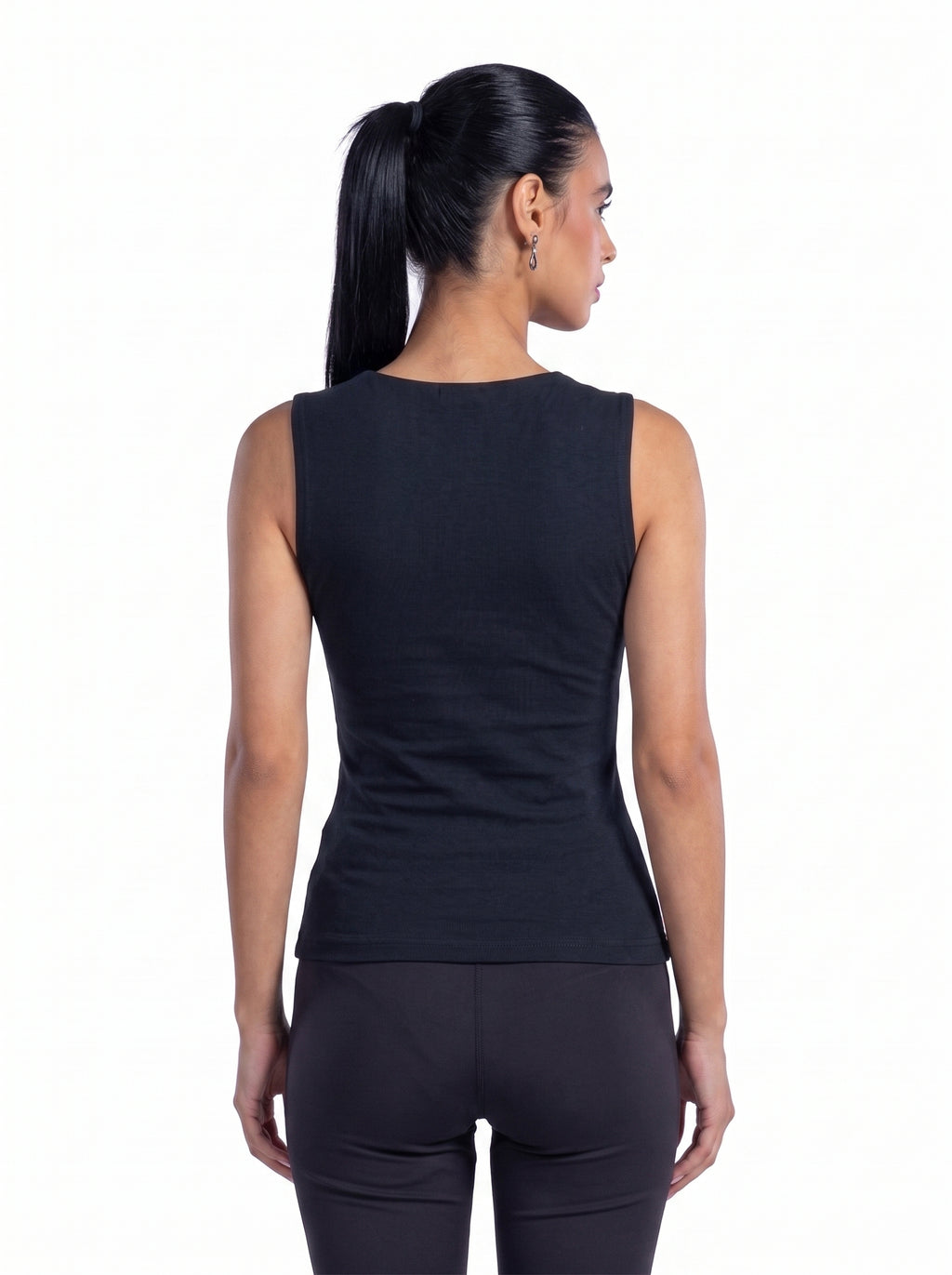 A woman shown from the back wearing a sleeveless black athletic top and black leggings against a plain white background.