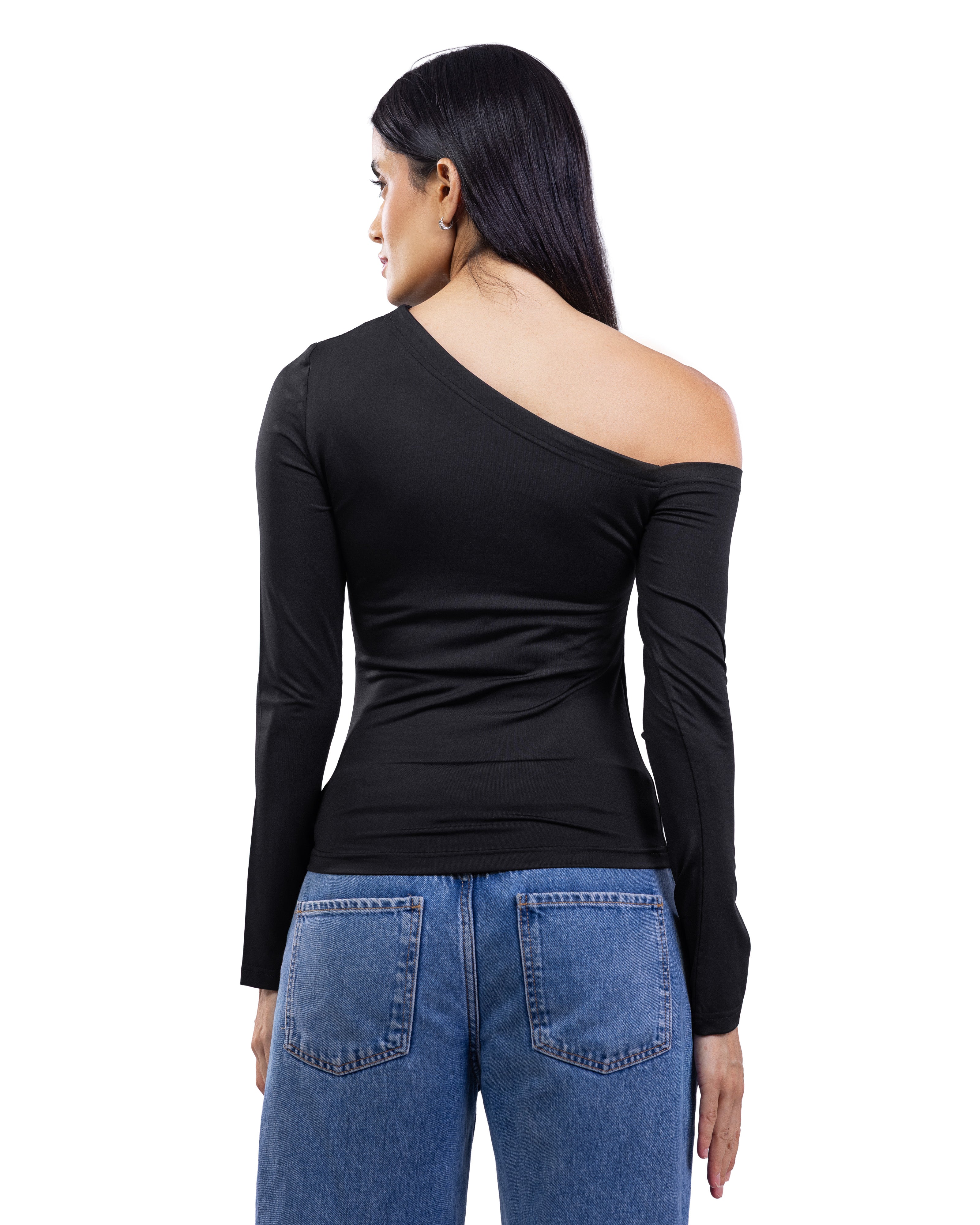 A woman shown from the back wearing a black long-sleeve one-shoulder top and blue jeans against a plain white background.