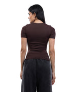 A woman shown from the back wearing a fitted short-sleeve dark brown top and dark gray wide-leg pants against a plain white background. [model:2]