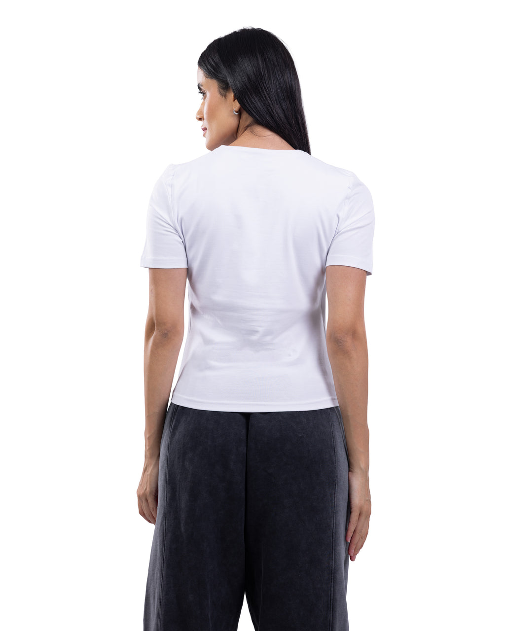 A woman shown from the back wearing a plain white short-sleeve crew-neck t-shirt and dark gray wide-leg pants, photographed against a solid white background.