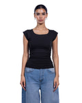 A woman modeling a black short-sleeve scoop-neck top paired with light blue jeans against a plain white background.