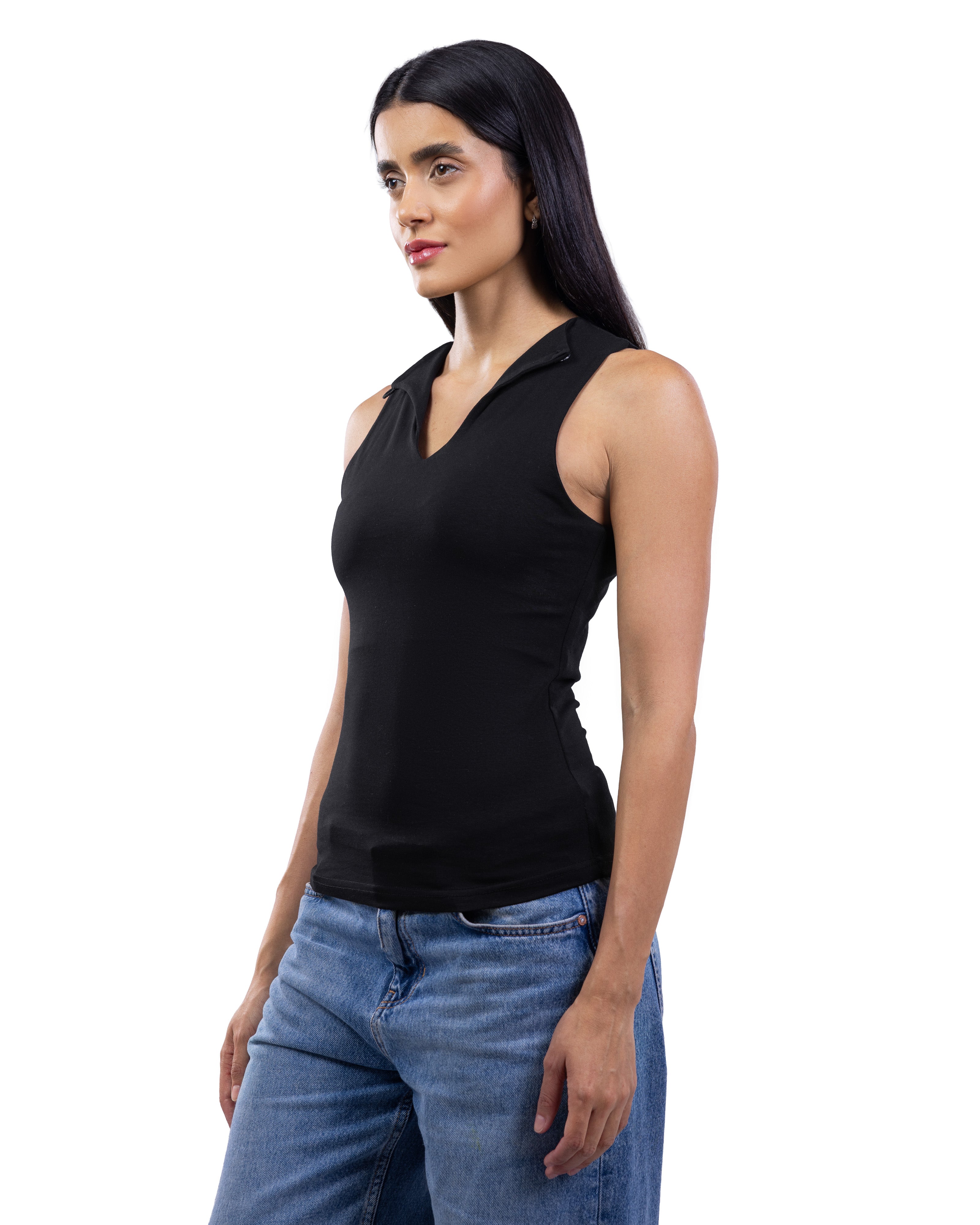 A woman modeling a black sleeveless V-neck tank top with a zippered collar, paired with blue jeans, against a plain white background.