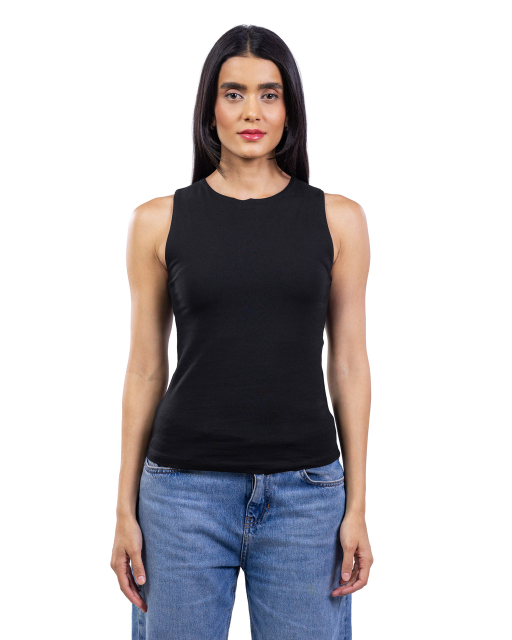 A woman modeling a sleeveless black tank top with a crew neck, paired with blue jeans, against a plain white background.